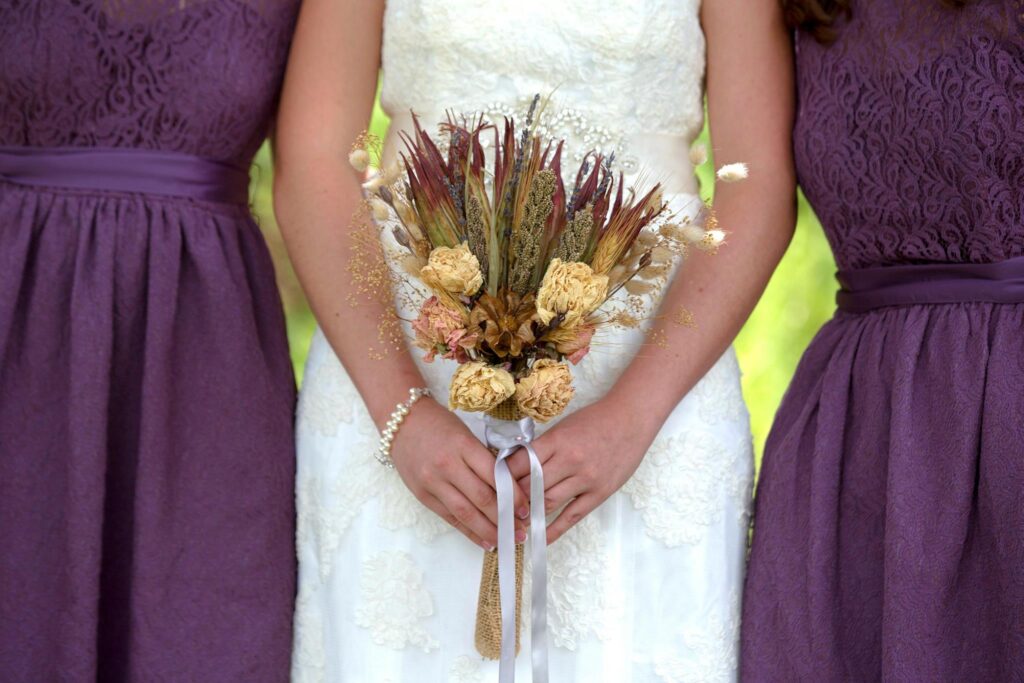Dried bouquets and purple bridesmaids