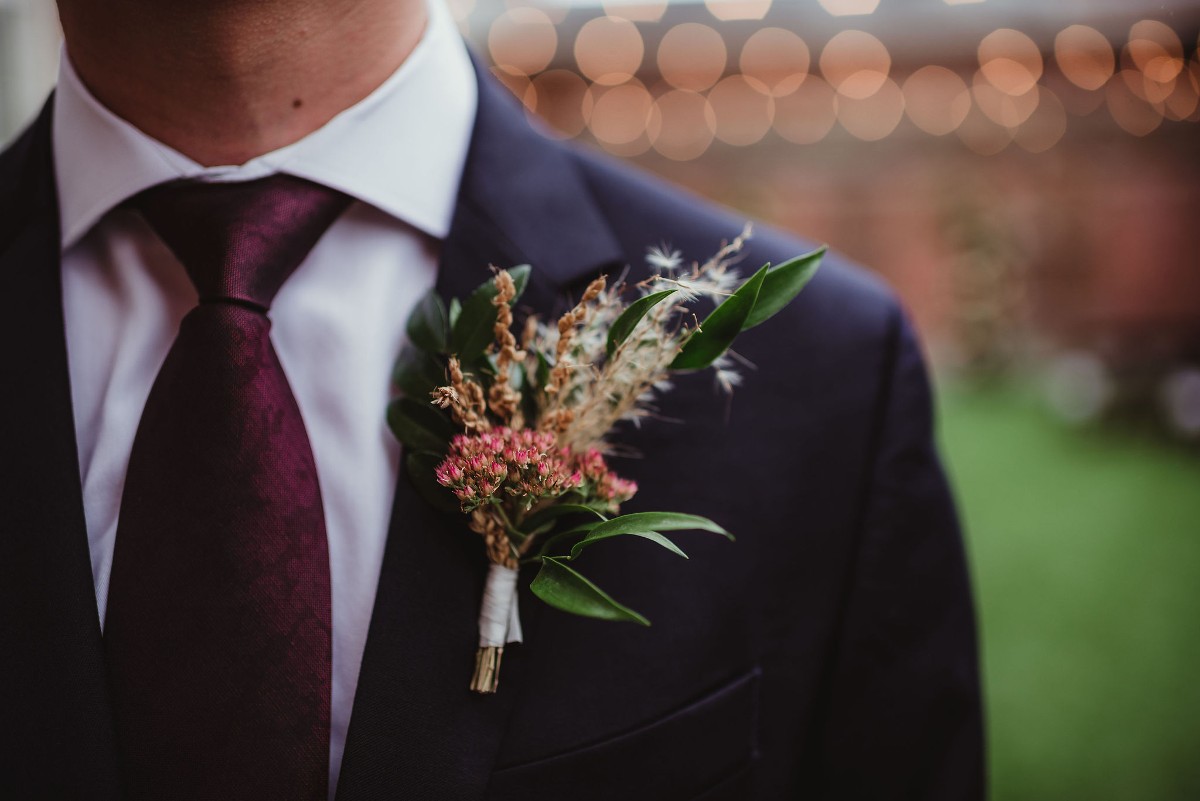 close up on a floral boutonniere