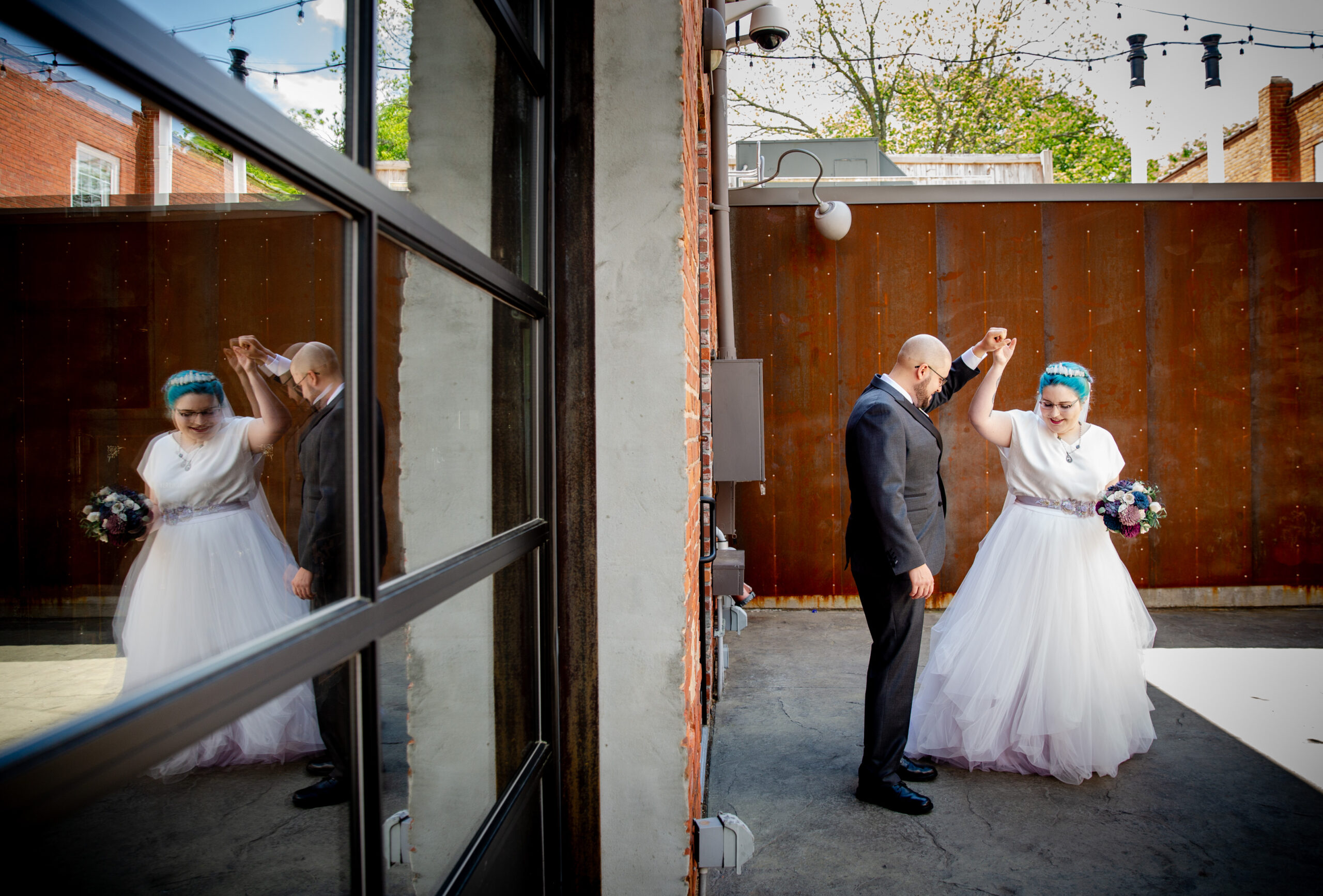 A groom in dark grey and bride in a white two skirt & blouse dance in an outdoor courtyard.
